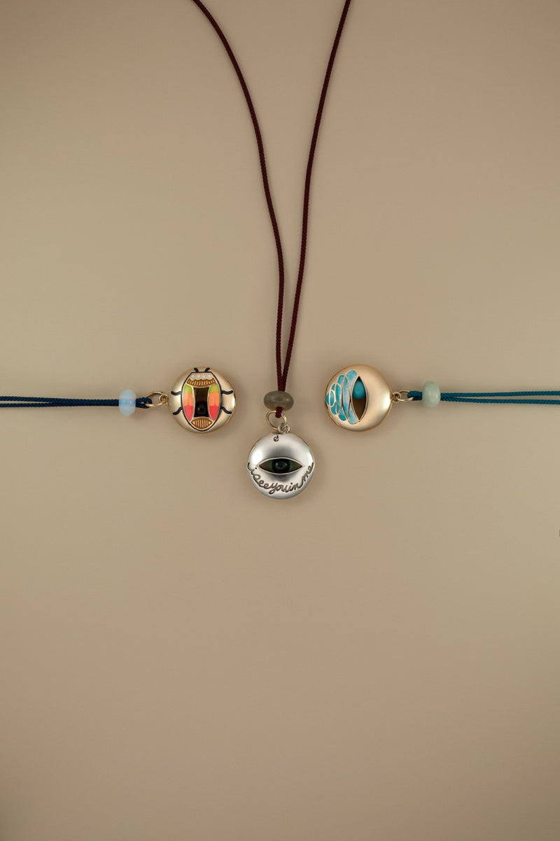 Mixed Metal Eye Pendant