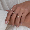 Encircled Diamond Baguette Ring